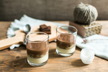 three-layered mousse dessert : chocolate , banana and vanilla