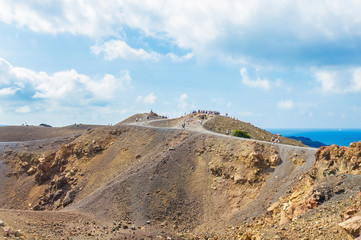 The volcanic island Nea Kameni. The uninhabited volcanic island in Aegean sea, Mediterranean, Greece.