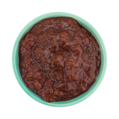 Bowl of wild strawberry preserves on a white background