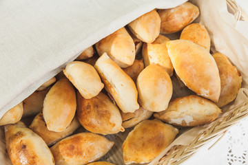 Pile of homemade cakes in picnic basket