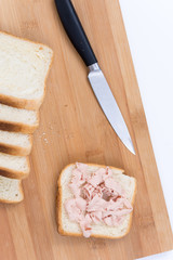 Flat lay toast bread with pate and kitchen knife