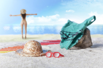 Naked woman by the sea