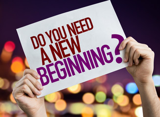 Do You Need a New Beginning? placard with night lights on background