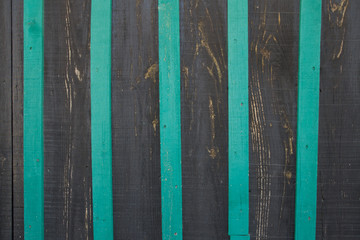 Striped unpolished wooden surface worktop, gray and green stripes,