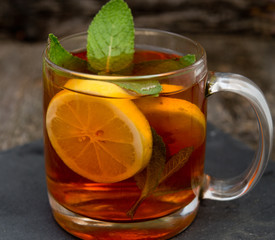 Black tea with a lemon and mint
