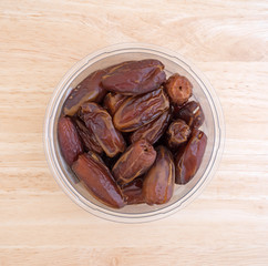 Tunisian pitted dates in a plastic container