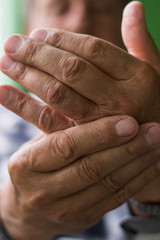 Fototapeta premium Clenched painful hands 