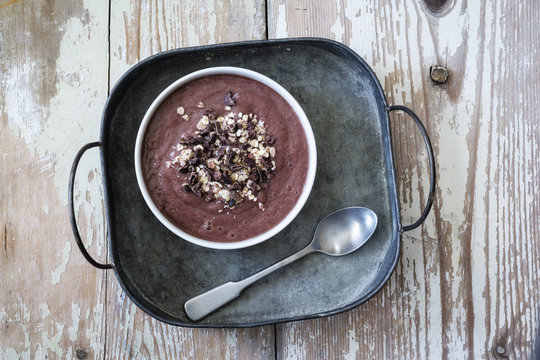 Smoothie Bowl with acai powder, mango, banana and cucumber