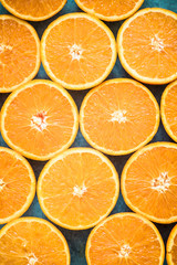 orange halves background from above