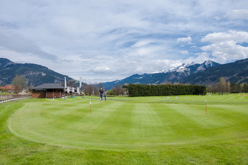 Fototapeta na wymiar Golf course with players