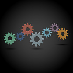 Abstract gear wheels on black background