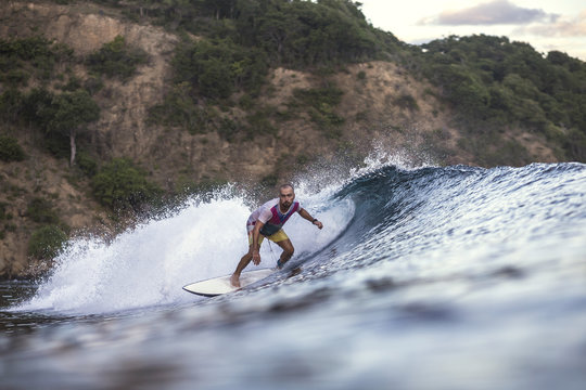 Indonesia, Sumbawa island, Surfer