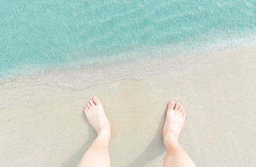 Close up blue sea water waves on white sand beach,Beautiful blue sea beach with white sand, Beautiful blue ocean beach close up shot, Clean beach with blue sea in Thailand