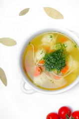 Chicken broth with meatballs