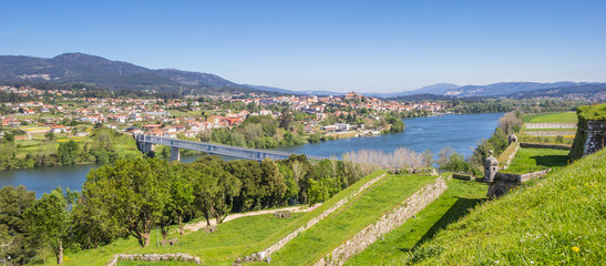 Panorama of fortified walls and river in Valenca do Minho - obrazy, fototapety, plakaty