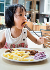 Asian Little Chinese Girl Eating Western Food
