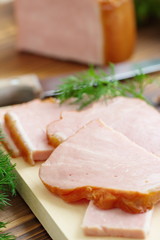 Sliced baked meat with garlic and spices