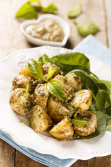 Potato salad with mint pesto and spinach