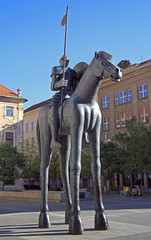 statue of rider on horse with disproportionate legs
