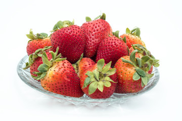 Strawberries in plate glass.