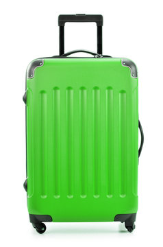 Large green polycarbonate suitcase isolated on white