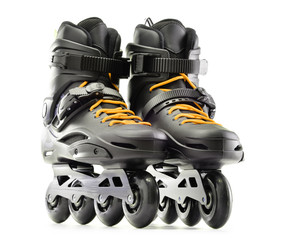 Pair of inline skates isolated on white background