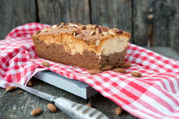 Vanilla cake with chocolate and nuts
