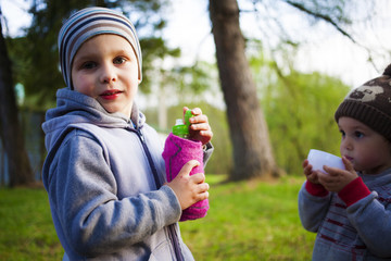 People sitting near the fire.