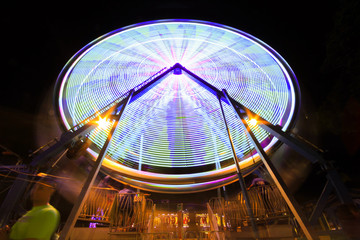 Long exposure of ferris wheel