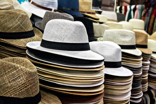 straw hats lie on the counter