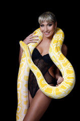 The beautiful woman with the big yellow snake