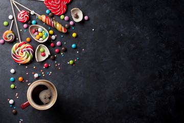Colorful candies and coffee cup