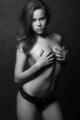 Fototapeta na wymiar fashion monochrome portrait of beautiful young nude woman