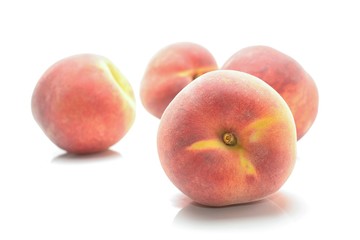 Ripe peach fruit isolated on white background