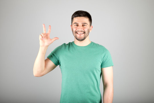 Man Showing Number By Fingers