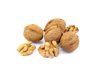 Fresh walnuts with a shell isolated on white background