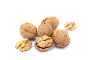 Fresh walnuts with a shell isolated on white background