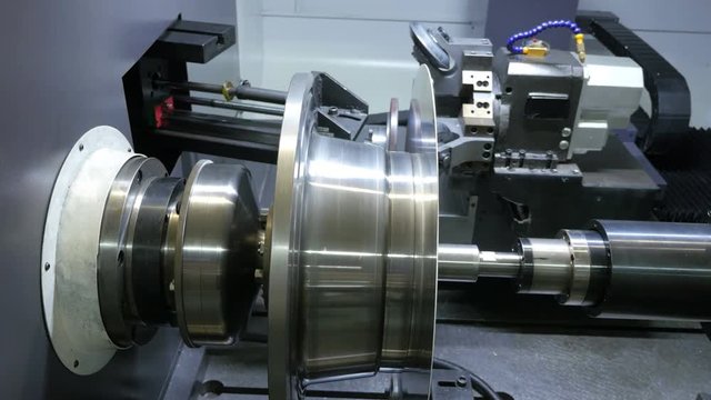 Metal Spinning machine shaping a peace of metal