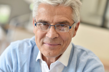 Portrait of senior man with eyeglasses