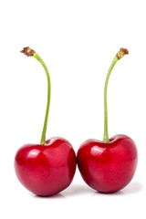 two sweet cherry closeup isolated on white background