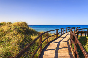 The Regional Natural Park Dune Costiere (Torre Canne): wooden walkway between sea dunes. (Apulia)-ITALY- The park covers the territories of Ostuni and Fasano along eight kilometers of coastline.