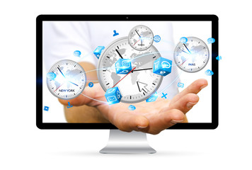 Businessman holding time of the world in his hand