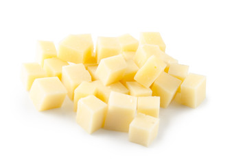 Cubes of cheese on white background. Top view.