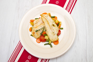 fresh cod on bed of mixed vegetables