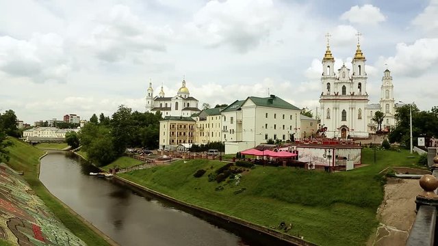 View of the city. River, church, area, bell tower. Slide effect with copy space