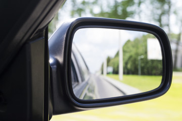 Fototapeta premium View to the right of the car mirror 