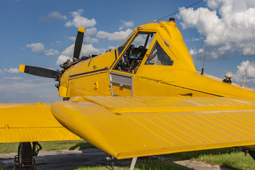 Yellow agricultural aircraft ready to fly