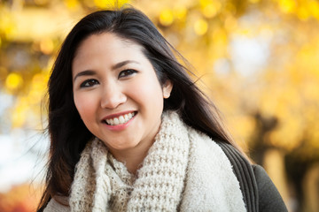 Young Asian woman outdoor autumn portrait