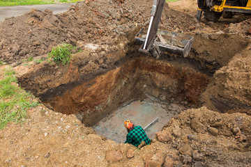 digging and leveling the bottom of the backyard septic tank