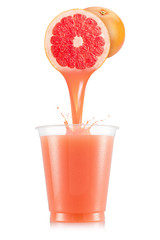 Pure grapefruit juice pouring out from fruit in plastic cup - obrazy, fototapety, plakaty